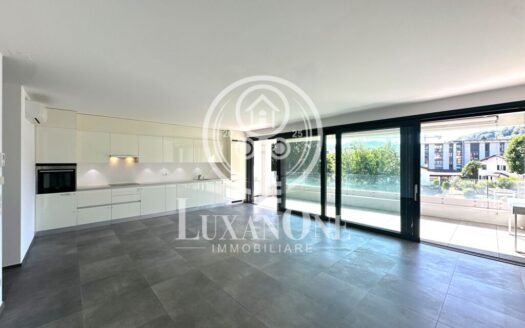 Modern 3.5-room apartment in Agno, just a few steps from the lake